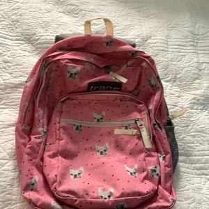 Pink with dog design jansport backpack